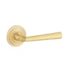 brass lever handle on round rose with escutcheons for interior and main doors