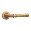 brass lever handle on round rose with escutcheon for interior doors