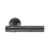 modern lever handle on round rose with escutcheon for interior doors