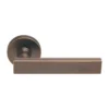 brass lever handle on round rose with escutcheon for doors