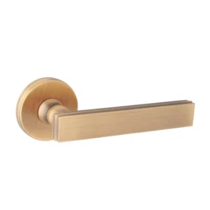 brass lever handle on round rose with escutcheon for doors