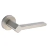 modern lever handle on round rose with escutcheons for interior doors