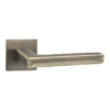 lever handle on square rose with escutcheons for doors